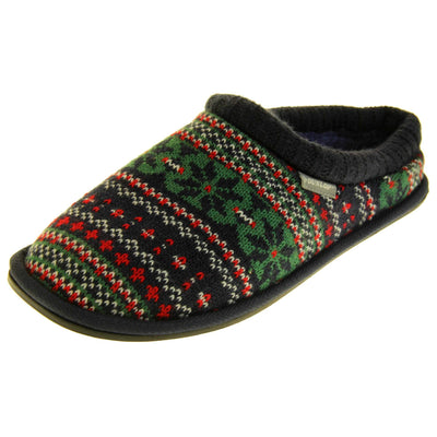 Mens warm mule slippers. Mens slippers in a mule style. With black knit fabric upper with green, red and white pattern. Black faux fur lining. Black hard synthetic soles with grip to the base. Left foot at an angle.