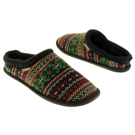 Mens warm mule slippers. Mens slippers in a mule style. With black knit fabric upper with green, red and white pattern. Black faux fur lining. Black hard synthetic soles with grip to the base. Both feet from an angle facing top to tail.