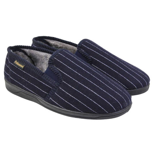 Mens warm slippers. Full back slippers with navy blue wool effect upper with white pin stripes. Navy elasticated panels joining the tongue to the top of the slippers. Small black label on the outside rim, with Oakenwood branding sewn in gold. Grey faux fur lining. Both feet together at an angle.