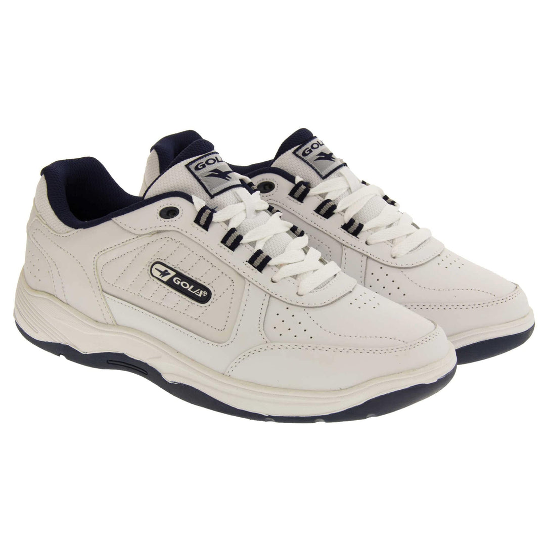 Mens white trainers. Classic trainer style with white leather upper and white stitching detail. White laces and sole with black textile lining. Black and white Gola branding to the side. White outsole with black bottom. Both feet together from an angle.