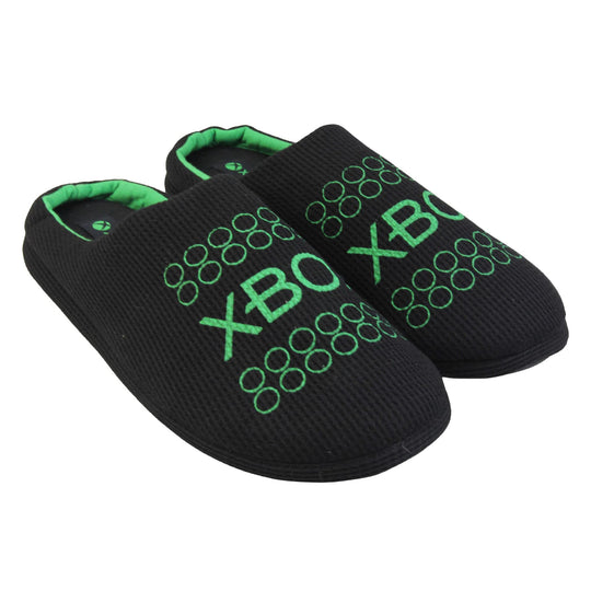Mens xbox mule slippers. Mule style slippers with black textile uppers with green Xbox branding on the top. Green and black textile lining and firm black sole. Both feet together at an angle.