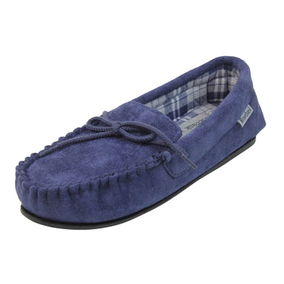 Moccasin slippers womens. Moccasin style slipper with navy blue faux suede upper and rope style bow to the top. Grey Rosebank label to the outside. Blue and white plaid textile lining. Black rubber sole. Left foot at an angle.