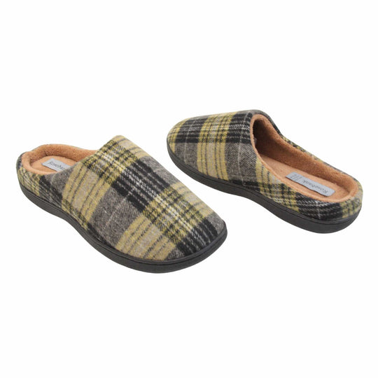 Mule slippers for men. Mule style slippers with fleecy yellow and grey tartan uppers. Brown terry lining and firm black sole. Both feet at an angle facing top to tail.