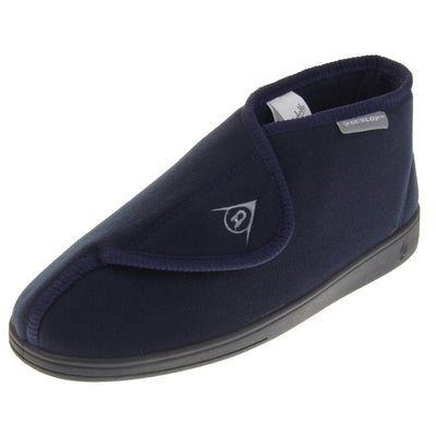 Orthopaedic slipper boots. Mens orthopaedic slippers in an ankle boot style. With a soft navy textile upper and blue textile lining. With an adjustable touch close top with a grey Dunlop logo on. Small grey label to the outer side edge with Dunlop written on. Thick black outdoor sole. Left foot at an angle.