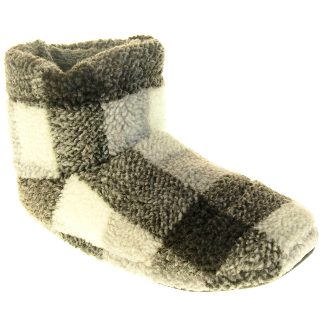 Outdoor Slipper Boots. Soft fleecy upper in a grey and white plaid. Firm synthetic black sole and grey faux fur lining. Right foot at an angle.