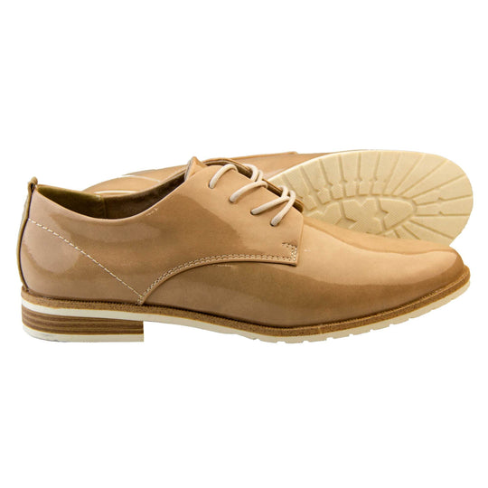 Patent oxfords. Womens oxford style shoes with a nude patent faux leather upper. Stitching detail to the sides. Cream laces and beige lining. Brown and cream sole with a very slight heel. Both feet from a side profile with the left foot on its side behind the the right foot to show the sole.