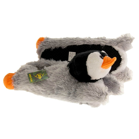 Penguin slippers. Womens padded slippers shaped like a penguin lying on its stomach. With grey faux fur body and black and white fluffy head. Both feet from a side profile with the left foot on its side behind the the right foot to show the sole.