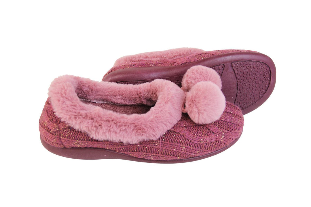 Pink knit with gold metallic thread, ladies slippers with faux fur trim and pom poms side view and sole