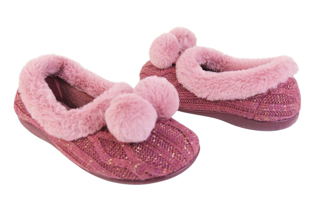 Pink knit with gold metallic thread, ladies slippers with faux fur trim and pom poms outside and instep of both view