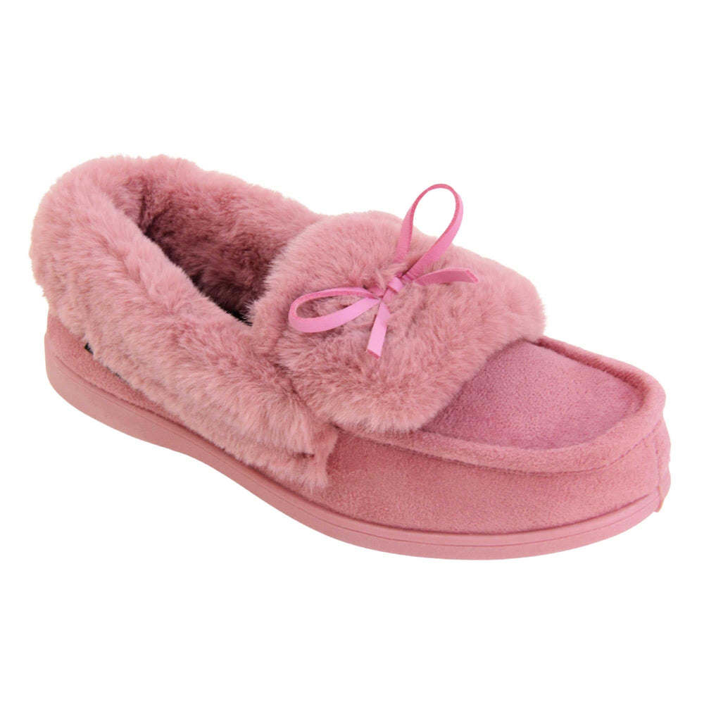 Pink moccasin slippers. Moccasin style slipper with pink faux suede upper and bow to the top. Pink faux fur collar, tongue and lining. Pink rubber sole. Right foot at an angle.
