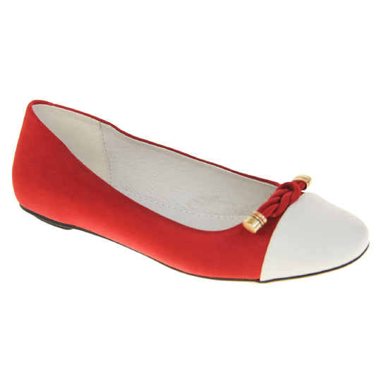 Red ballet flats. Womens ballerina style shoes with a red faux suede upper with white toe. Braided red rope detail to the top with gold studs to the end. White real leather lining and black sole. Right foot at an angle.