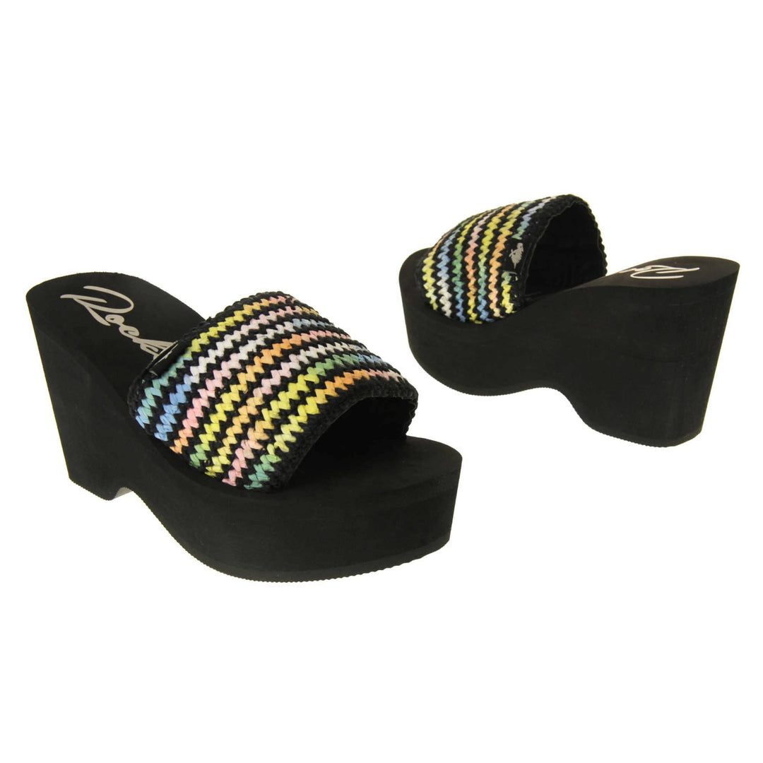 Womens Black Rocket Dog Sandals - Black foam sole and platform with a black hessian upper and a pastel rainbow zigzag design. Both feet facing opposite directions.