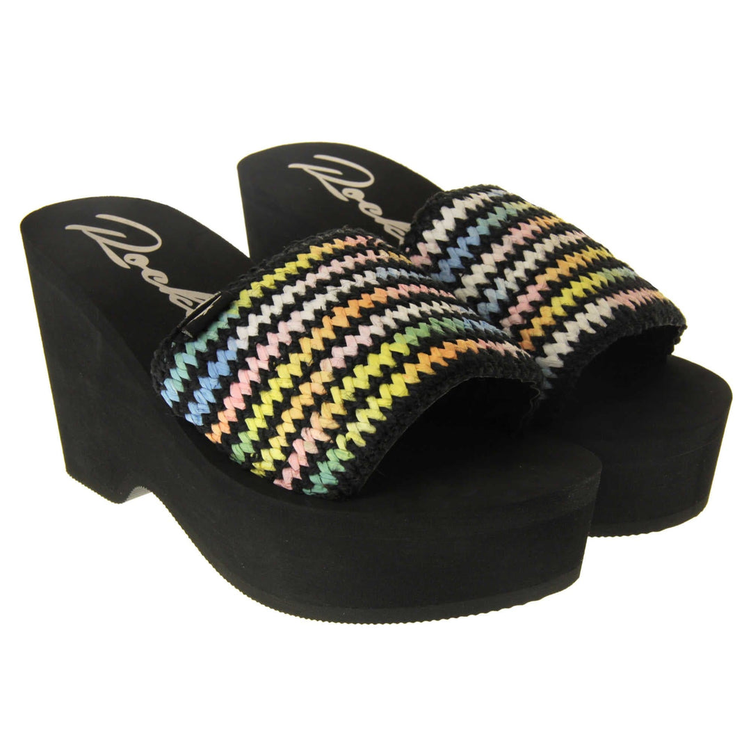 Womens Black Rocket Dog Sandals - Black foam sole and platform with a black hessian upper and a pastel rainbow zigzag design. Both feet at an angle.