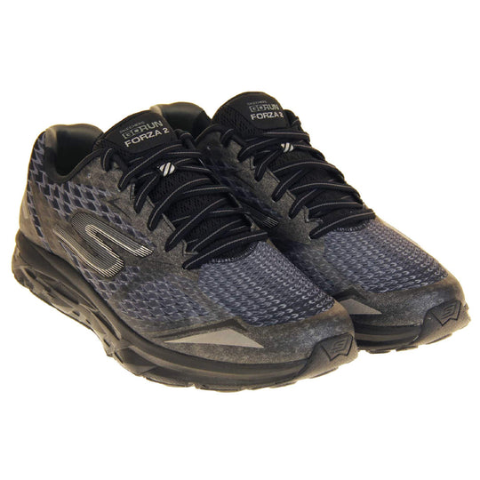 Skechers go run mens. Black mesh upper. Black and grey laces and black textile lining. Grey and white Skechers logo to the side and chunky black outsole with grip. Both shoes together at an angle.