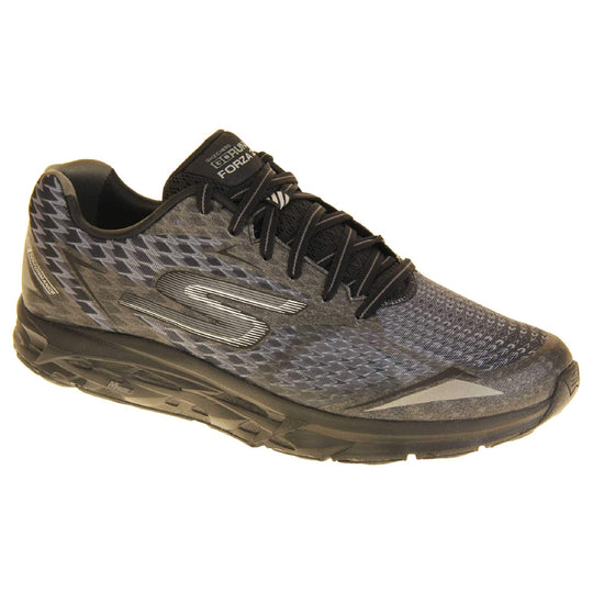 Skechers go run mens. Black mesh upper. Black and grey laces and black textile lining. Grey and white Skechers logo to the side and chunky black outsole with grip. Right foot at an angle.