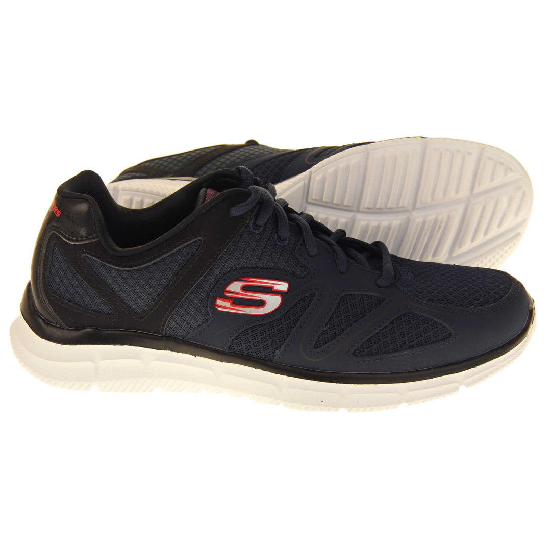 Skechers mens trainers Navy blue mesh and leather upper with black leather accents to the back. Navy laces and black textile lining. Red and white Skechers logo to the side and chunky white outsole with grip. Both feet from a side profile with the left foot on its side to show the sole.
