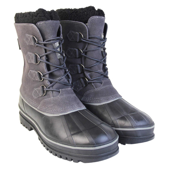 Skechers waterproof boots. Black high ankle boots with a waterproof suede upper and rubber outsole. Elastic faux laces to the front with Skechers branding to the tongue. Black fleecy collar and Thinsulate lining inside the boot. The chunky sole has a grey line running all the way around the top. Both feet together from an angle.