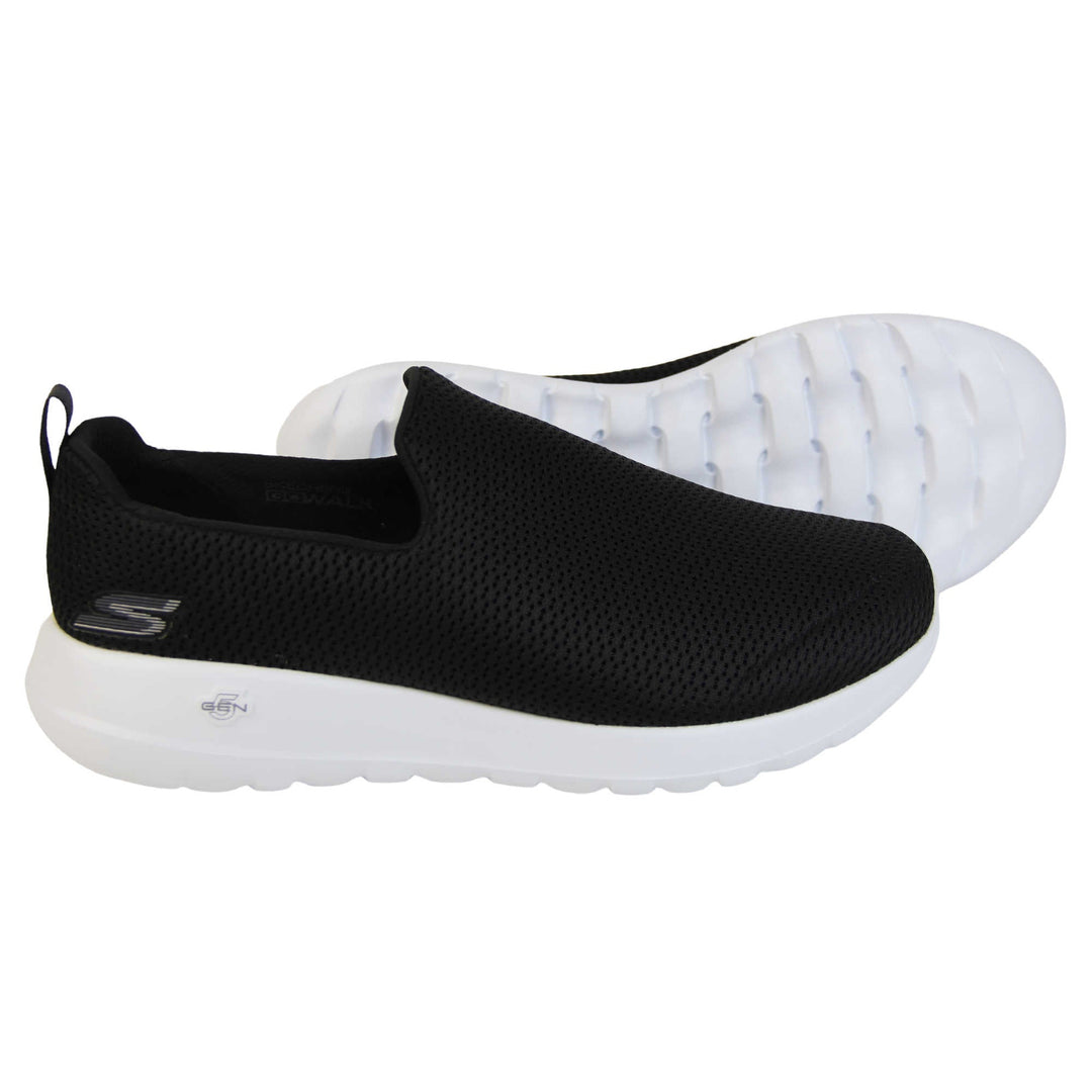 Skechers wide fit trainers. Mens loafer style trainers. Black woven mesh upper. Skechers S logo to the back. chunky white sole with grip to the bottom. Black textile lining. Both feet from a side profile with the left foot on its side to show the sole.