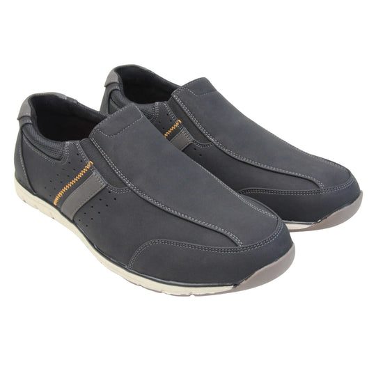 Smart black trainers mens. Slip on trainers with black faux suede uppers. Elasticated side gussets in black and a grey diagonal stripe to the side of the shoe. Black collar around the neck of the shoe with Oakenwood branding to the heel. Black lining and a white outsole with grey sole. Both feet together at a slight angle.