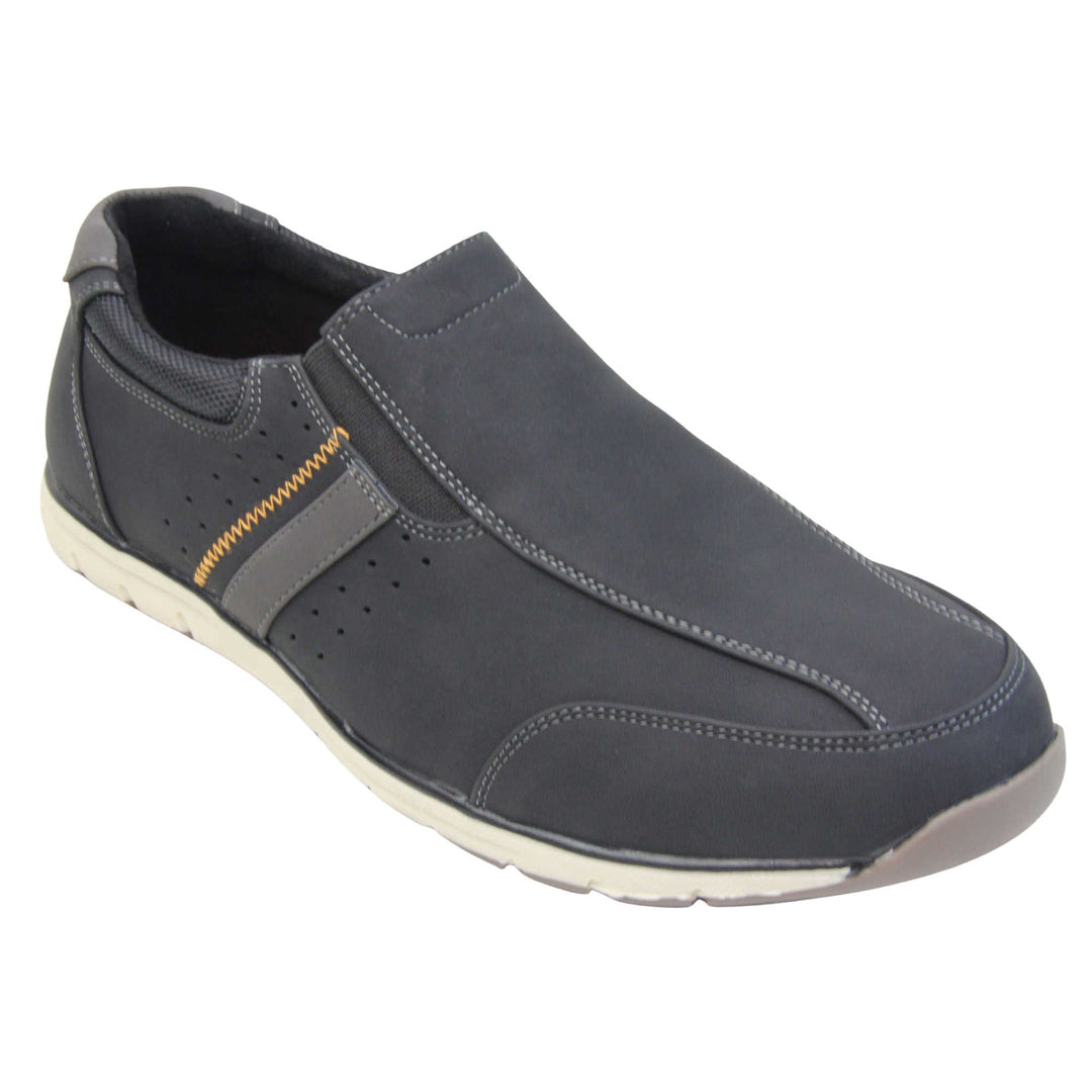 Smart black trainers mens. Slip on trainers with black faux suede uppers. Elasticated side gussets in black and a grey diagonal stripe to the side of the shoe. Black collar around the neck of the shoe with Oakenwood branding to the heel. Black lining and a white outsole with grey sole. Right foot at an angle.