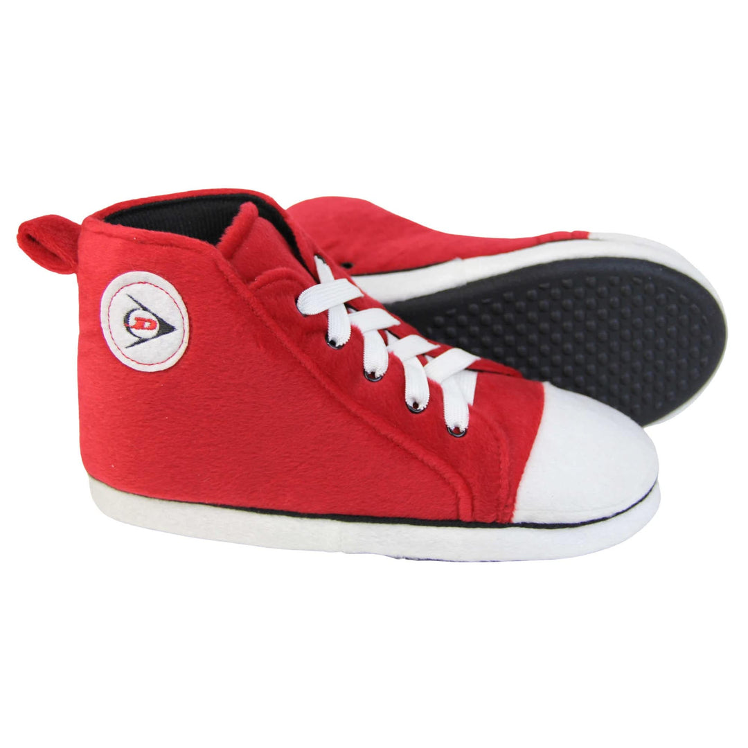 Sneaker slippers. Womens slippers shaped like a high top trainer. With red cushioned uppers and and white toe and sole. With elasticated laces with a white circle on the outside ankle with a Dunlop symbol. Both feet from a side profile with the left foot on its side behind the the right foot to show the sole.