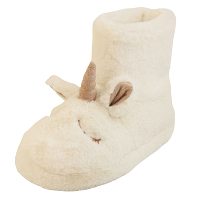 Sparkly unicorn slipper boots. Furry slipper boots in white with a cute unicorn face on. With glittery ears and horn. The same colour faux fur lines the boot. Left foot at an angle.