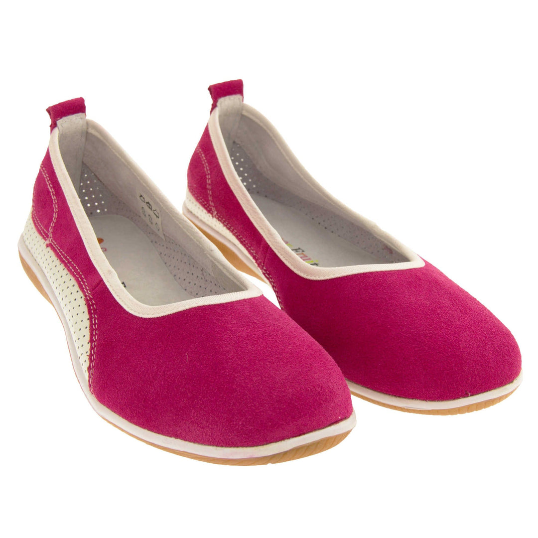 Suede ballet flat. Ballet style flat with a pink suede upper. White leather mesh runs along the bottom of the back half of the shoe. Brown sole. White edging around the sole and the opening of the shoe. White leather lining. Pink suede leather loop on heel of the shoe to help pull on. Both feet together at a slight angle.