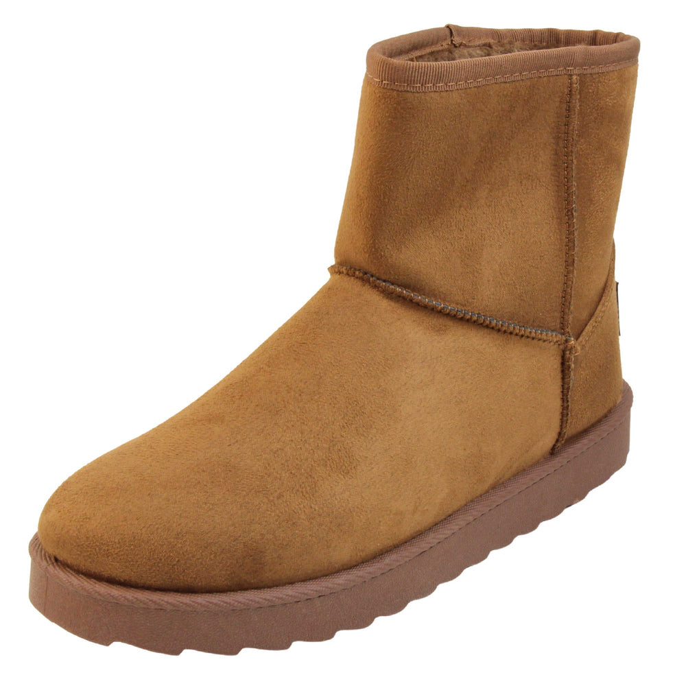 Tan winter boots women's. Ankle boots with a tan faux suede upper and stitching detail. Brown faux fur lining. Chunky brown sole with deep tread to the bottom. Left foot at an angle.