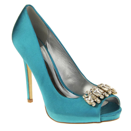 Teal wedding shoes. Classic women's peep toe high heels with a teal satin upper. Metallic silver insole with Sabatine branding. Teal satin stiletto heel with a cream sole. Diamante cluster detailing across the toes. Right foot at an angle.