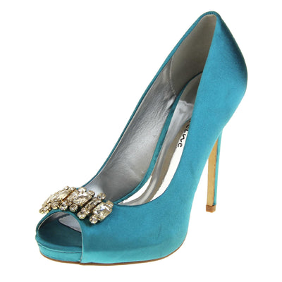 Teal wedding shoes. Classic women's peep toe high heels with a teal satin upper. Metallic silver insole with Sabatine branding. Teal satin stiletto heel with a cream sole. Diamante cluster detailing across the toes. Left foot at an angle.