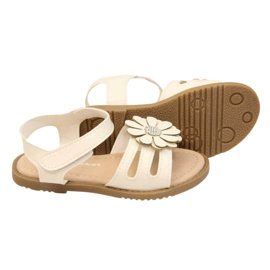 Toddler girl flower sandal. Strappy sandals with white faux leather strappy upper. With around the ankle strap with hook and loop fastening. White flower detailing to the front of the shoe with a diamante middle. Beige coloured insole with Skyrocket branding in white. Brown sole with grip to the bottom. Both feet from a side profile with the left foot on its side behind the the right foot to show the sole.