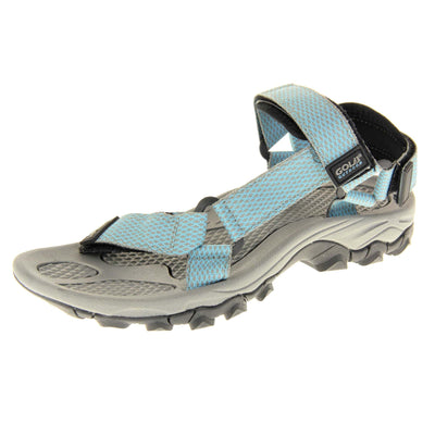 Walking sandals women. Womens sporty style sandals. Grey textile straps with blue criss-cross pattern. Black padding to the heel and over foot strap. Touch fasten strap around the heel. Black Gola branding to the ankle of the sandal. Grey textile lining and black sole with chunky grip to the base. Left foot at an angle.