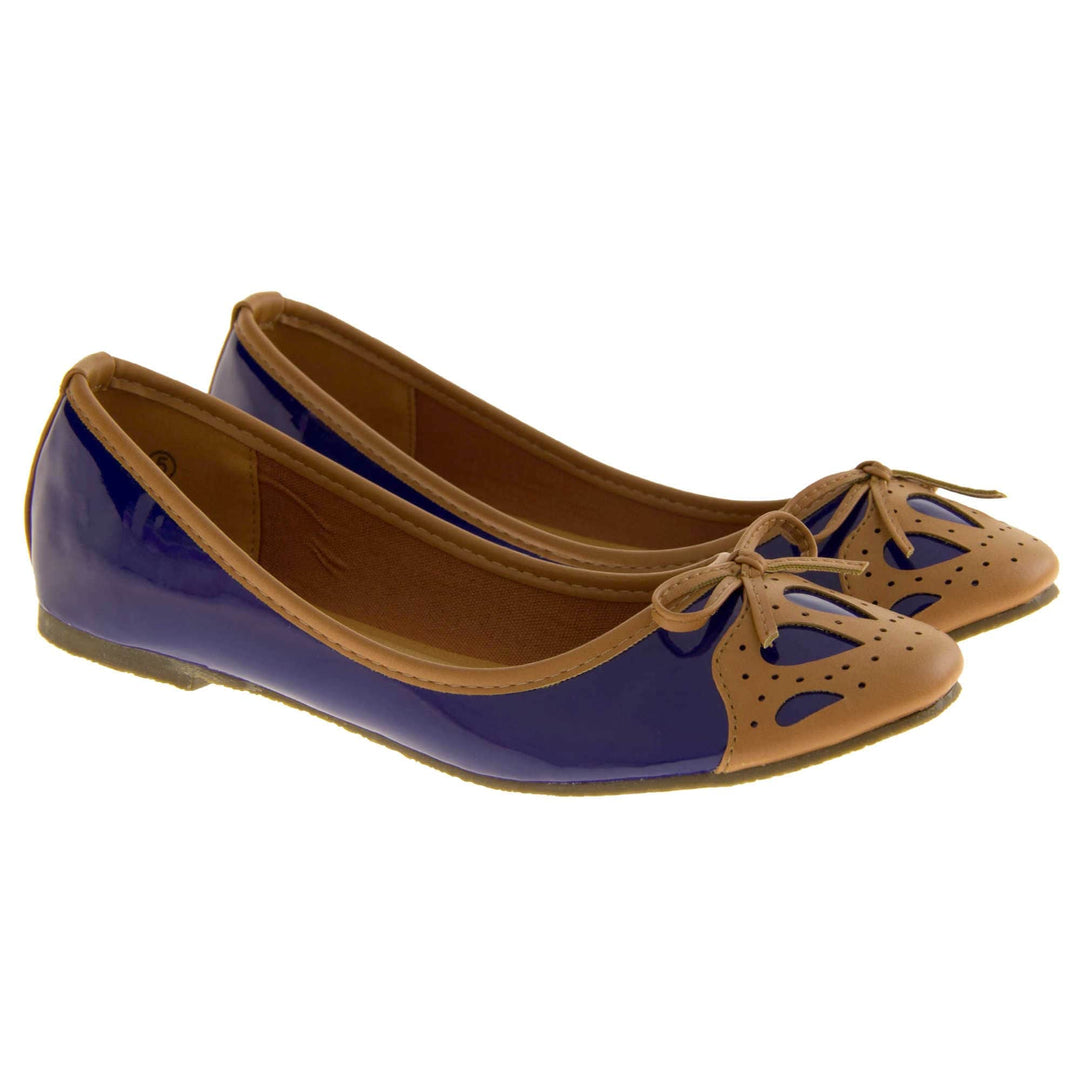 Women's ballet flats. Blue patent leather effect ballet pumps with brown faux leather collar and detailing to the toe. Brown sole with a very slight heel. Both feet together from a slight angle.