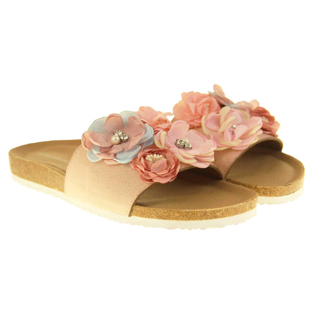 Womens Flower Sandals - Stunning festival style flowers across the top strap decorated with pearls and diamantes. Soft tan faux leather footbed sandals with white soles. Perfect for weddings, beaches, holidays or casual wear. Both feet view.