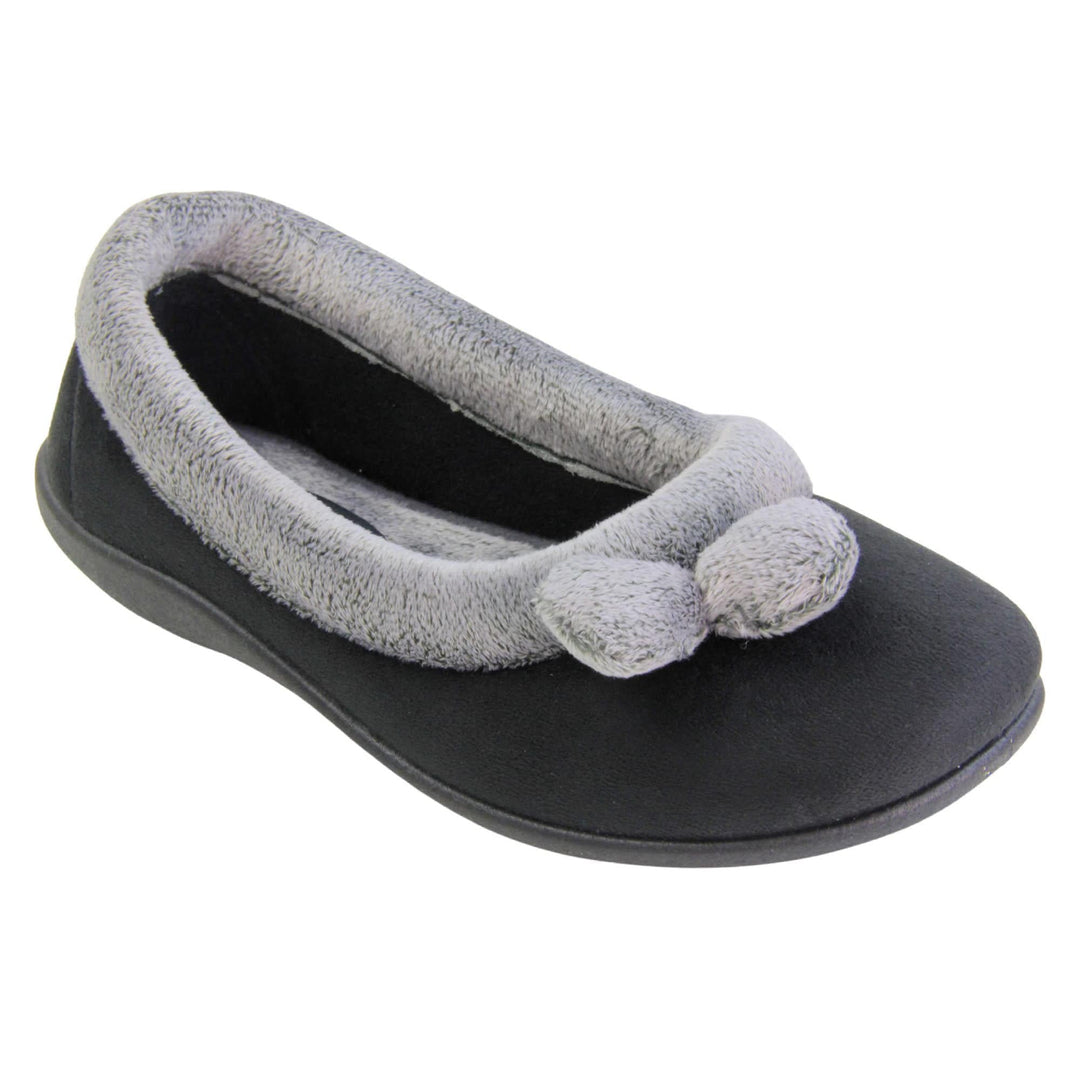Womens ballerina slippers. Womens ballerina style slippers with black velour uppers. Grey, plush textile collar and two pom poms to the front of the shoe. Matching textile lining. Firm black sole. Right foot at an angle.