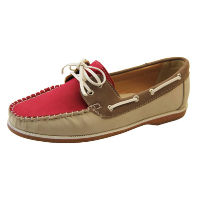 Womens Deck Shoes with Laces - Fuchsia Pink upper and tongue with contrast stitching and lace up fastening. Beige PU upper to sides and tan brown cuff and rim, with tan soles with white above. Lace cords to side in lines with eyelets in boat shoe design. Left side view.
