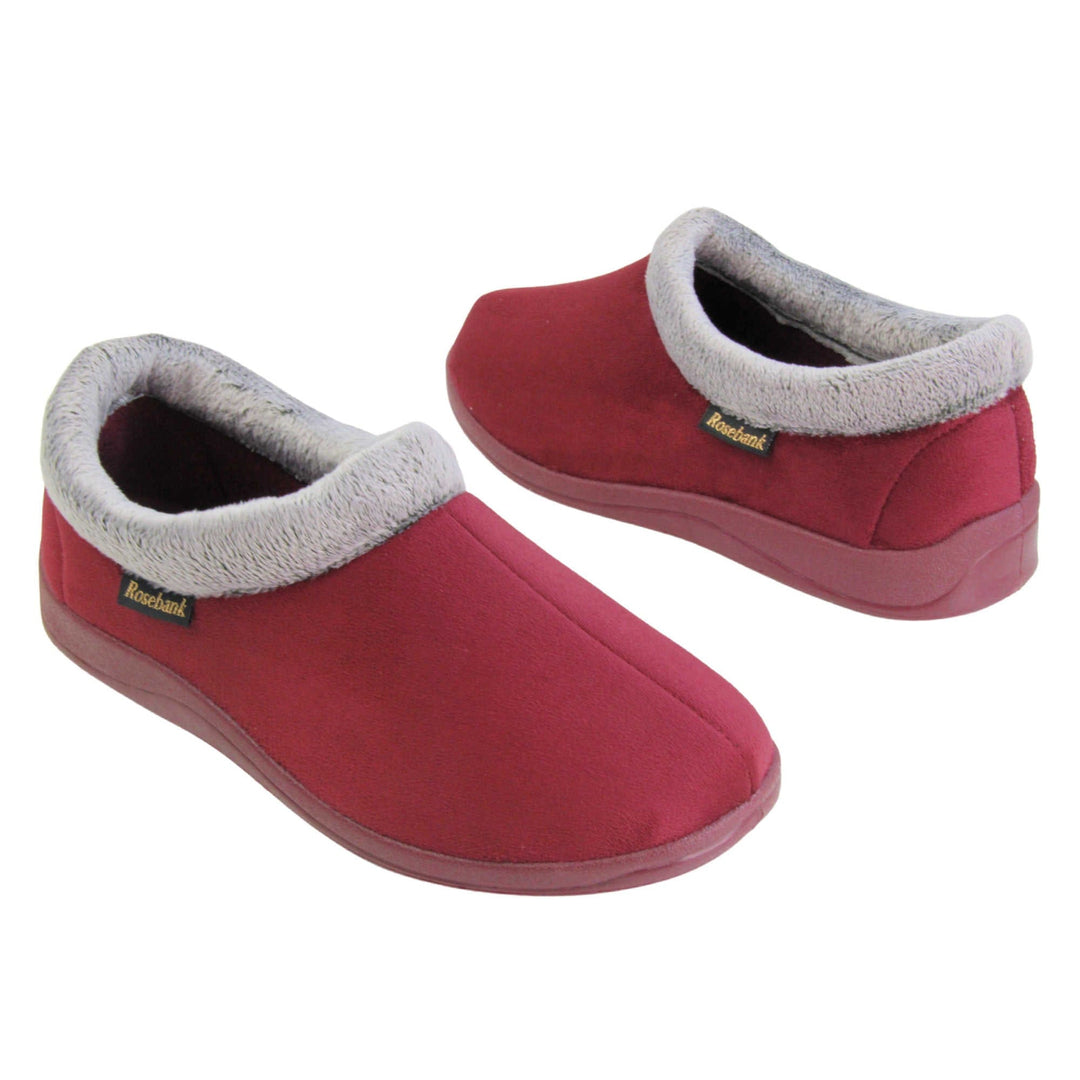 Womens boot slippers. Womens low top bootie style slippers with burgundy velour uppers. Grey plush textile collar. Matching textile lining. Firm red sole. Both feet at an angle facing top to tail.