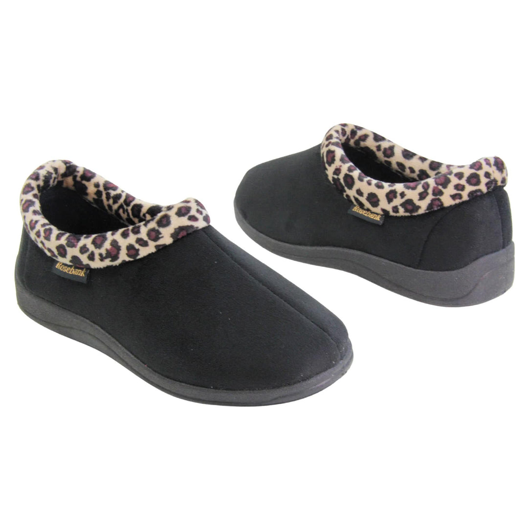 Womens bootie slippers. Womens low top bootie style slippers with black velour uppers. Leopard print plush textile collar. Black textile lining. Firm black sole. Both feet at an angle facing top to tail.
