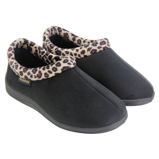 Womens bootie slippers. Womens low top bootie style slippers with black velour uppers. Leopard print plush textile collar. Black textile lining. Firm black sole. Both feet together at an angle.