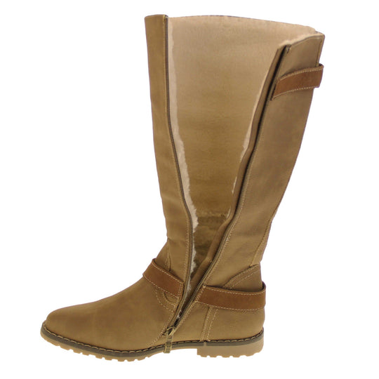 Womens brown tall boots. Almost knee high boots with a light brown faux suede upper. Brown faux leather strap around the ankle and the back half of the neck of the boot. Brown sole with chunky tread. Zip fastening down the inside of the leg. Right foot at an angle showing the inside of the leg unzipped to show the lining. Cream wool from the ankle down. Cream faux fur from the ankle up.