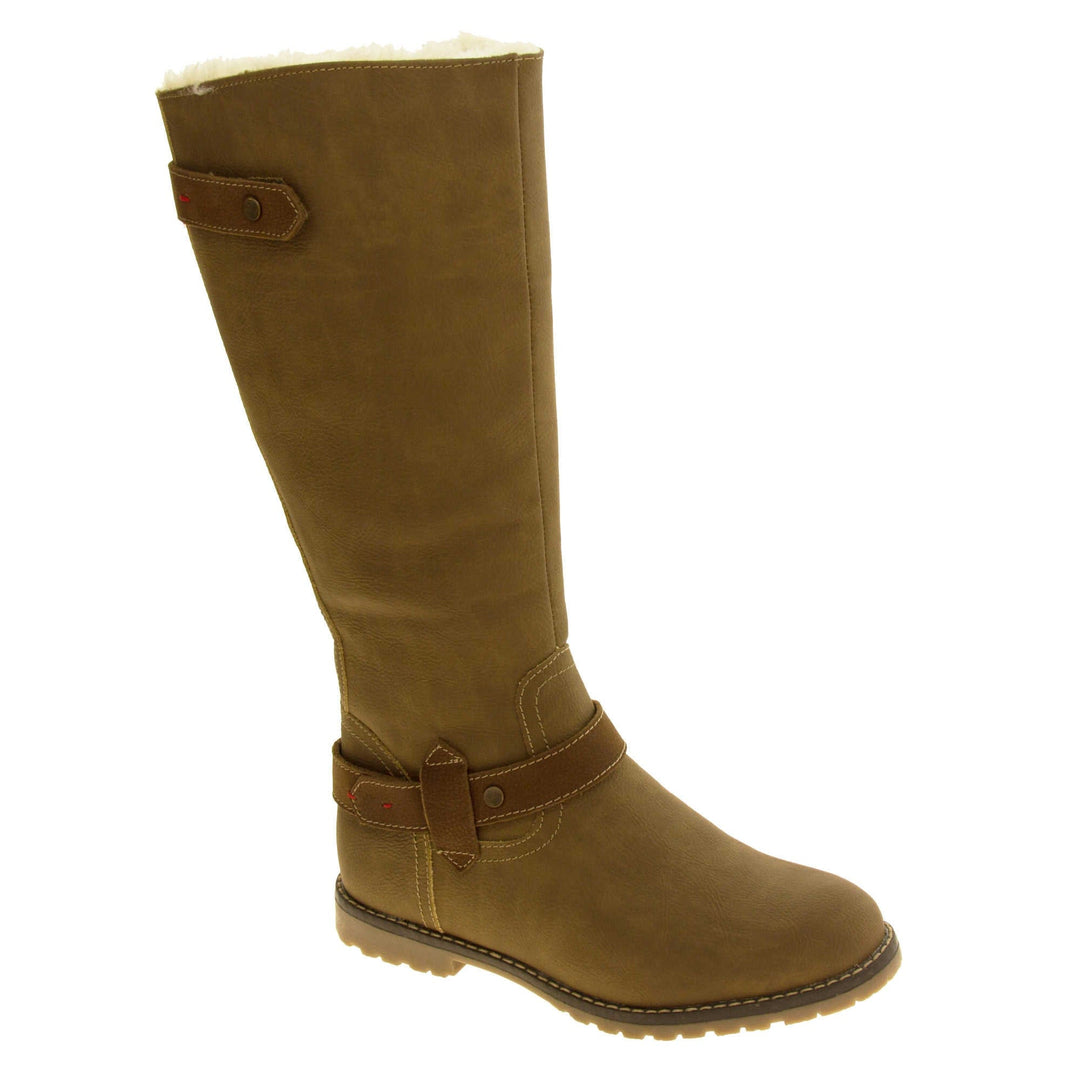 Womens brown tall boots. Almost knee high boots with a light brown faux suede upper. Brown faux leather strap around the ankle and the back half of the neck of the boot. Brown sole with chunky tread. Zip fastening down the inside of the leg. Right foot at an angle.