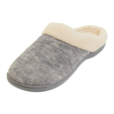 Womens cotton slippers. Womens slippers in a mule style. With grey cotton knit uppers and cream faux fur collar and lining. Grey hard synthetic soles with grip to the base. Left foot at an angle.