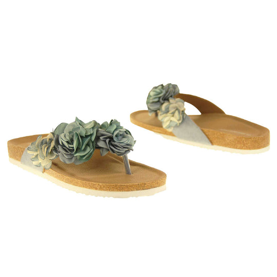 Womens Blue Floral Sandals - Stunning festival style flowers across the top strap in different shades of blue and cream with toepost to front. Soft tan faux leather footbed sandals with white soles. Perfect for weddings, beaches, holidays or casual wear. Both feet facing opposite directions.