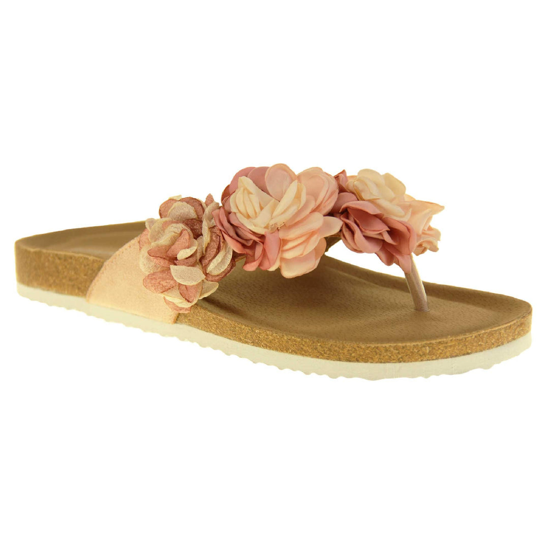 Womens Pink Floral Sandals - Stunning festival style flowers across the top strap in different shades of pink and cream with toepost to front. Soft tan faux leather footbed sandals with white soles. Perfect for weddings, beaches, holidays or casual wear. Angled right side view.