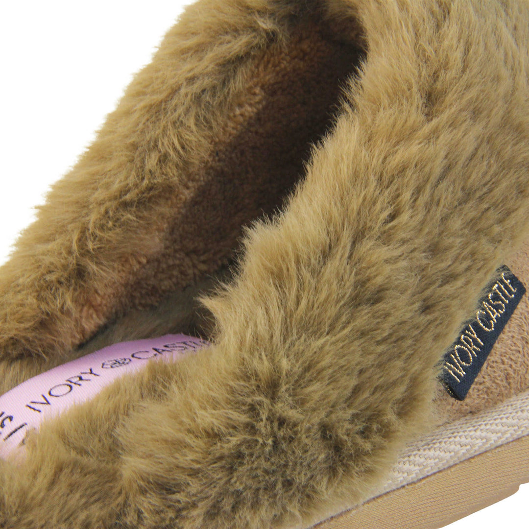 Womens Ivory Castle Slippers. Mule style slippers with taupe faux suede uppers. Taupe faux fur lining and collar. Firm taupe outsole with grip on the bottom. Close up of the fluffy lining and collar.