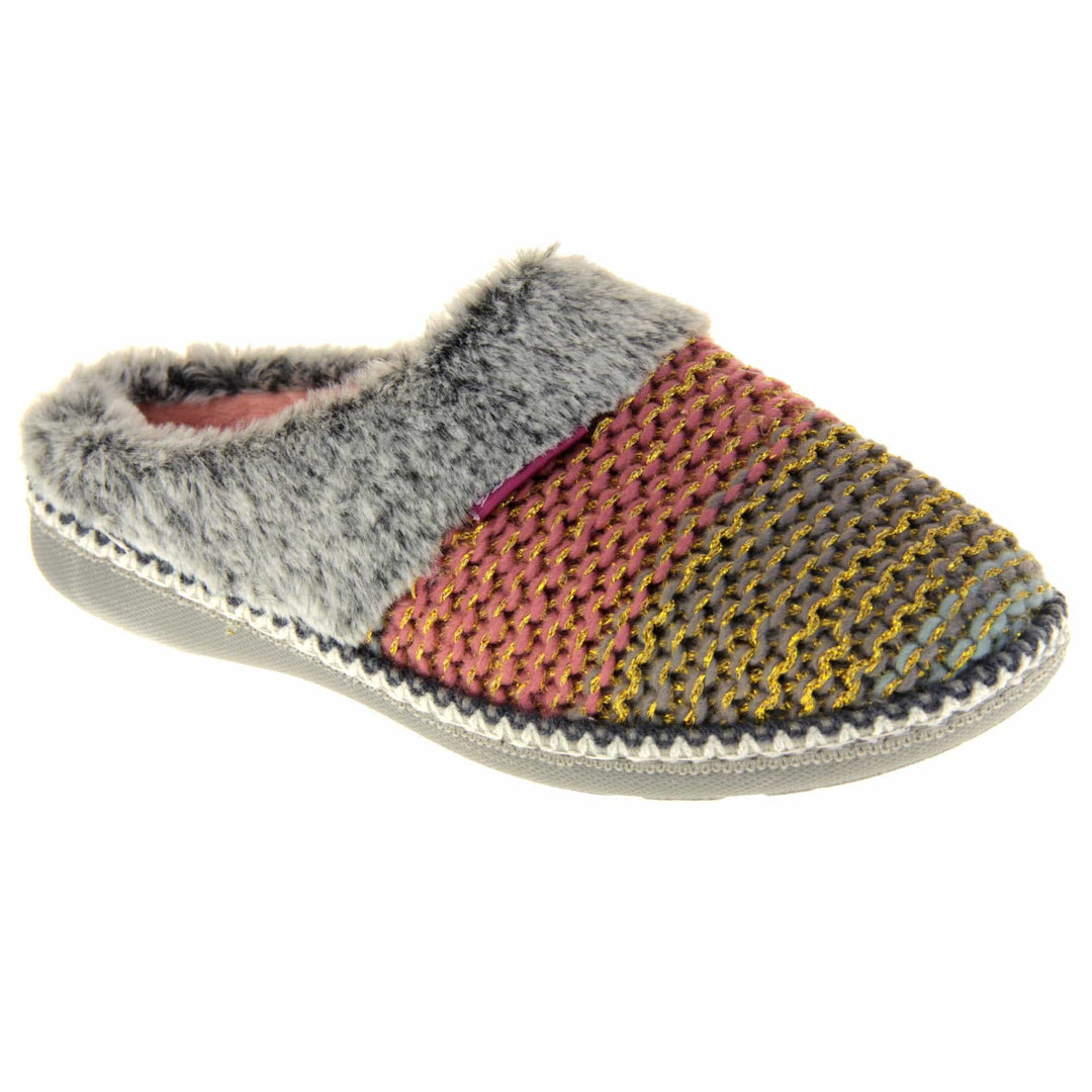 Womens knit slippers. Mule style slippers with pink and blue knit uppers with metallic gold thread running through. Grey faux fur collar. Pink textile lining and firm grey outsole with grip on the bottom. Right foot at an angle.