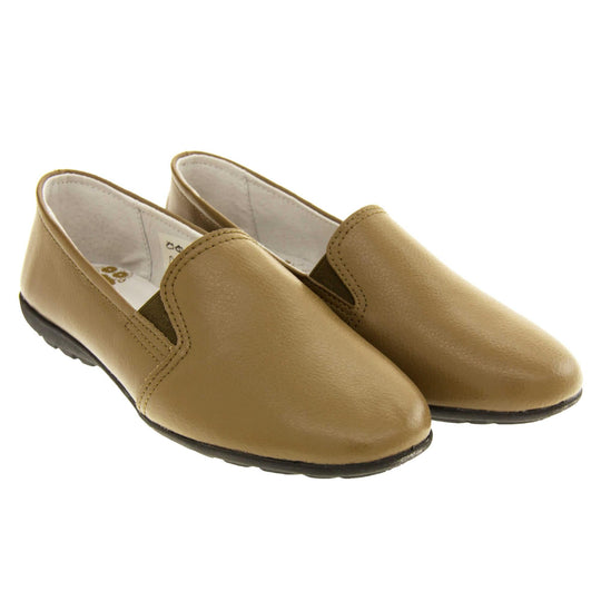 Women's loafers brown. Slip on loafer style shoes with a taupe leather upper. Brown elasticated gusset. Black sole with grip to the bottom. Both feet together at a slight angle.