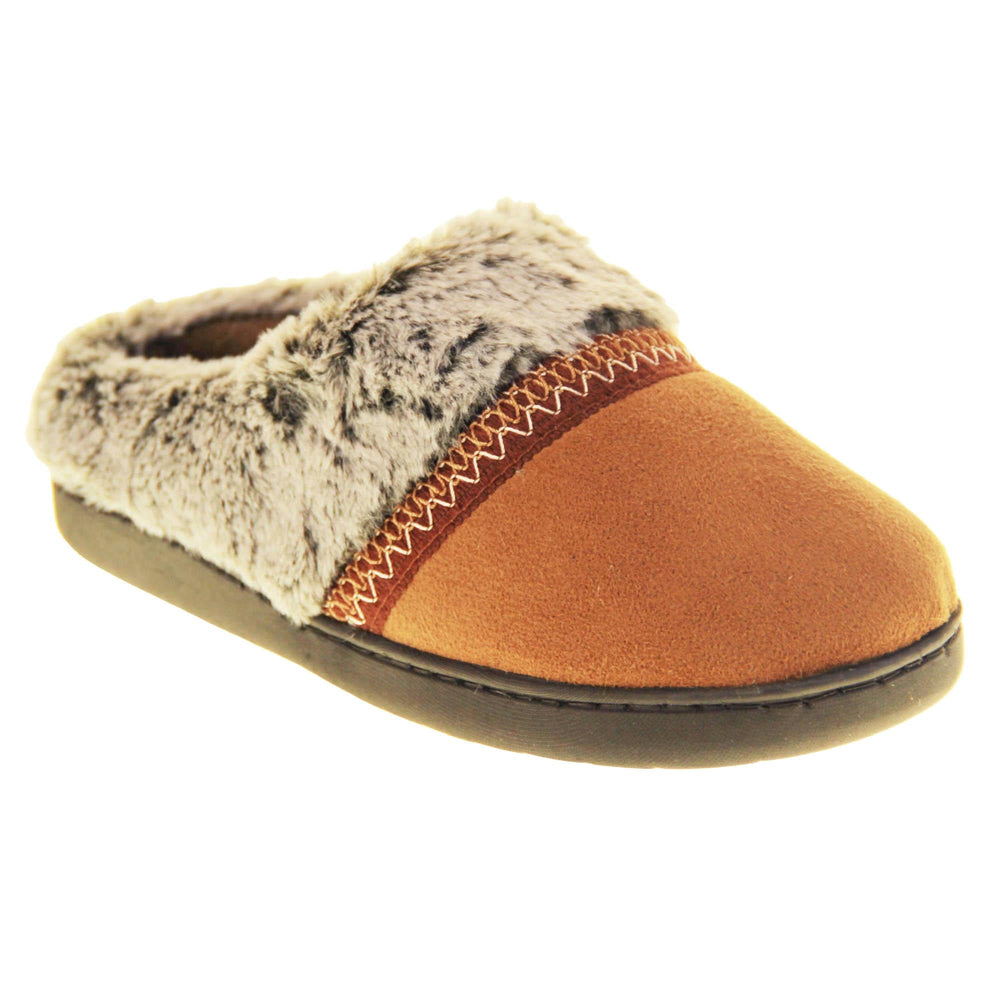 Womens Memory Foam Slippers. Mule style slippers with brown faux suede uppers. Grey faux fur collar with a red stripe with embroidered zigzag pattern where the upper meats the faux fur. Brown textile lining and firm black outsole with grip on the bottom. Right foot at an angle.