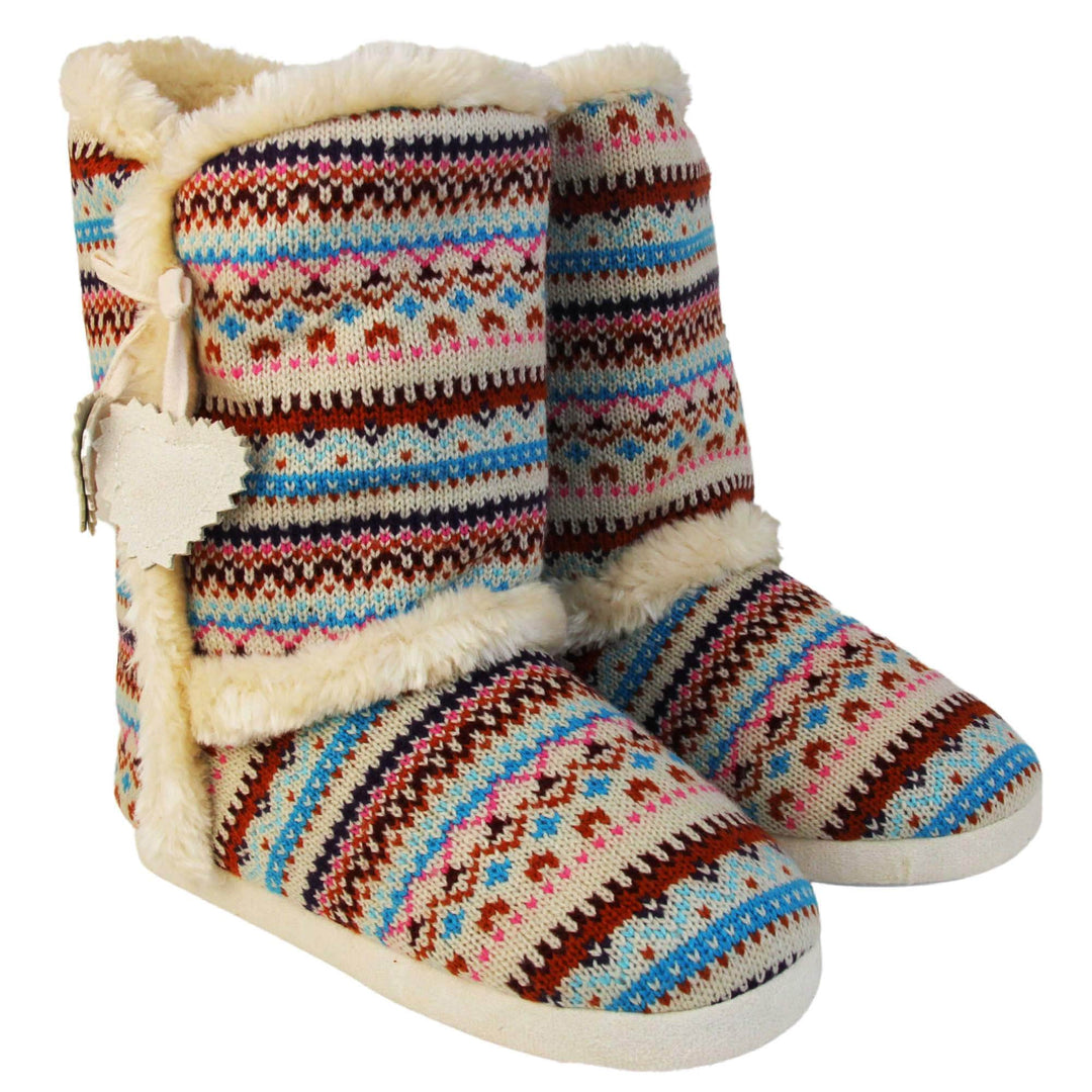 Womens Nordic Slipper Boots - Cream multi Christmas knit upper in nordic & scandinavian style with felt love heart tassles to the side, light beige plush faux fur trim and lining. Both feet together at angle.