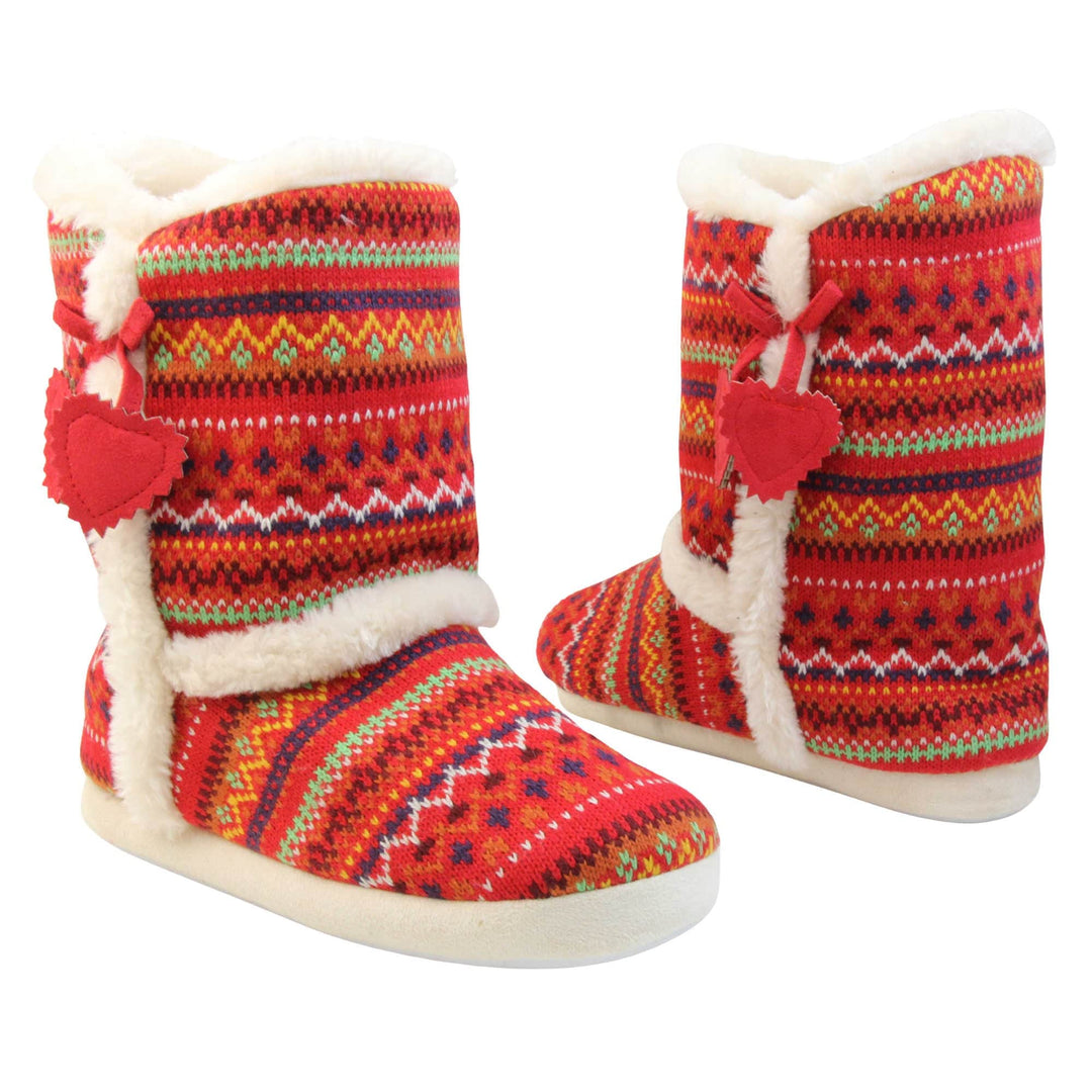 Womens Nordic Slipper Boots - Red multi Christmas knit upper in nordic & scandinavian style with felt love heart tassles to the side, light beige plush faux fur trim and lining. Both feet at an angle, facing top to tail.